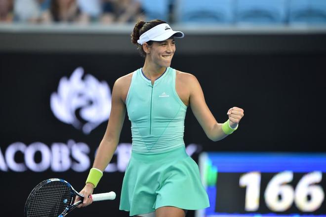 Muguruza avanza con confianza a cuartos