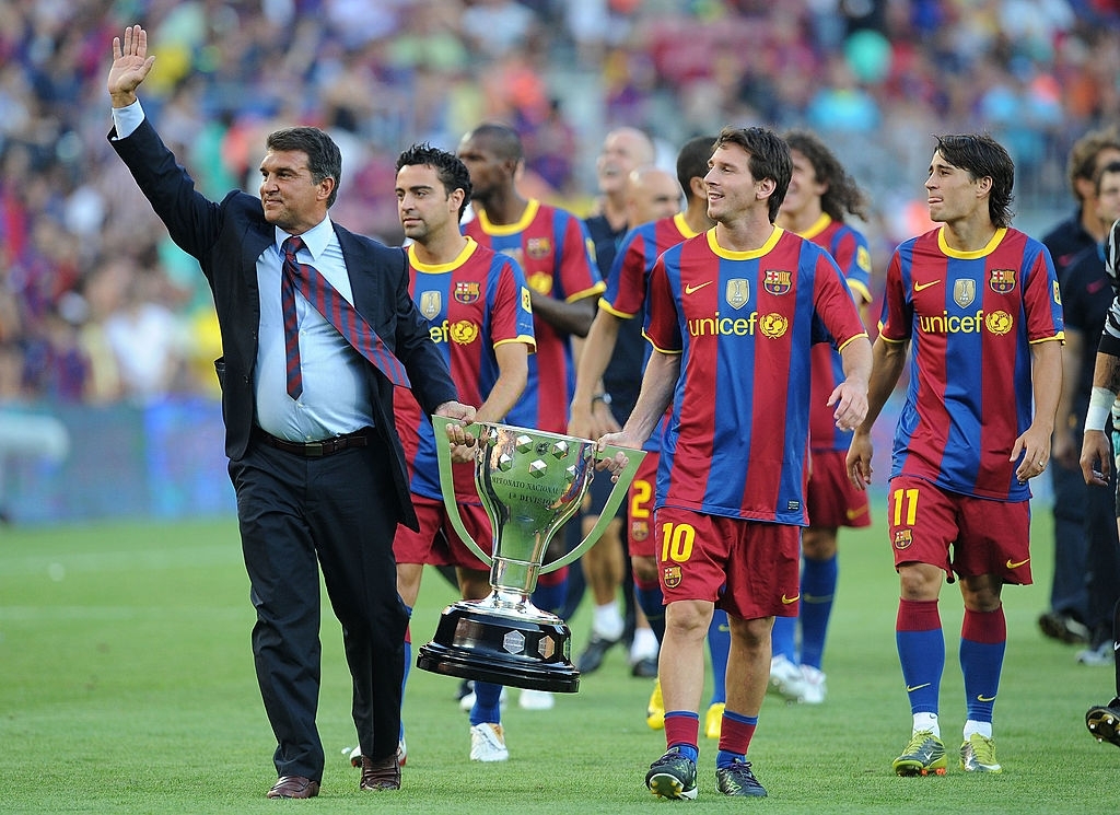 Joan Laporta y Lionel Messi en 2010.