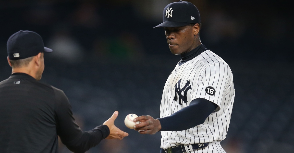 Aroldis Chapman y Aaron Boone